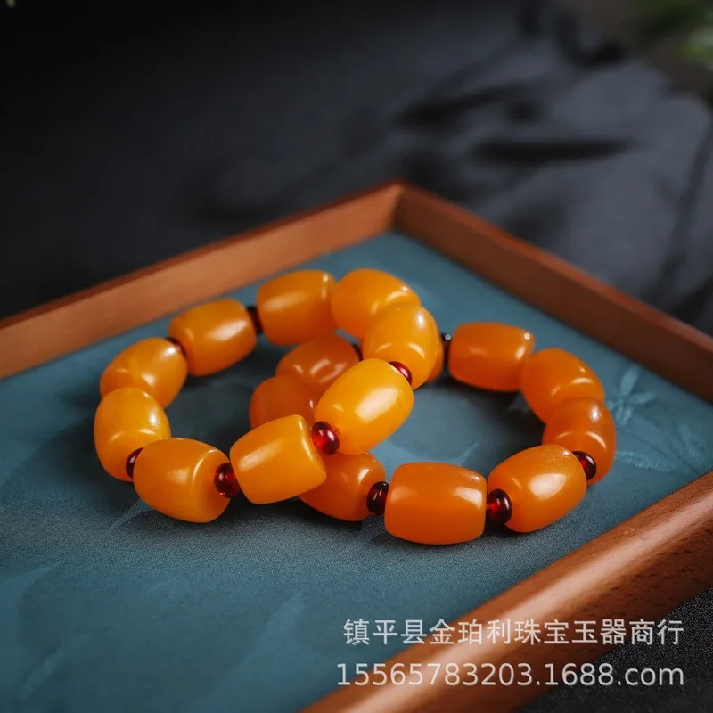 Gift amber bracelet with pendant in natural shape, in chicken fat yellow color