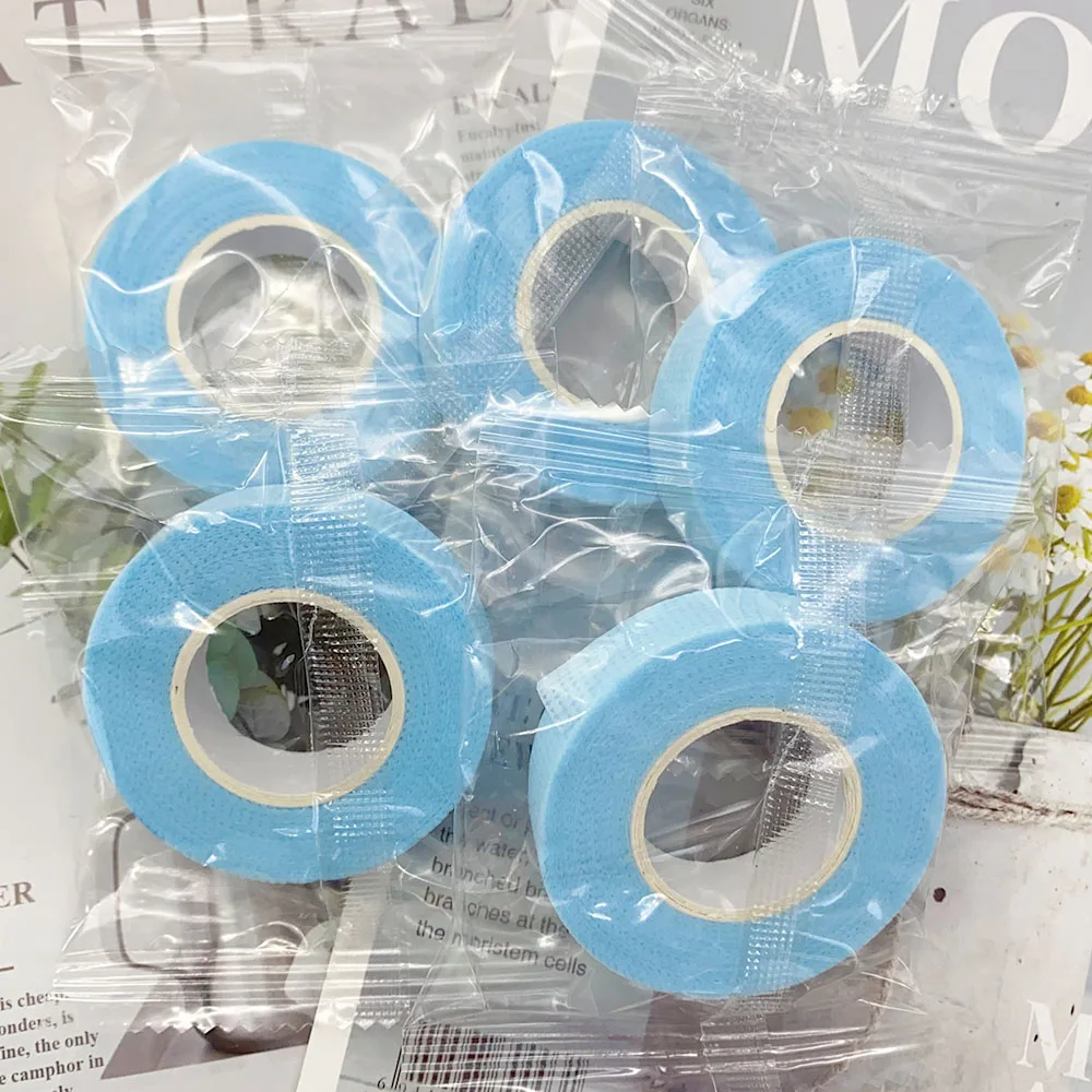 Nastro per ciglia 20 rotoli 9M Nastro di carta per estensione ciglia Toppe adesive in tessuto non tessuto traspirante all'ingrosso sotto il cuscinetto per gli occhi