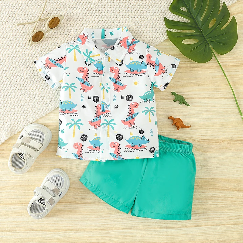 

2024-02-23 Lioraitiin Toddler Boys Summer Shorts Sets Short Sleeve Lapel Dinosaur Print Button Shirt Solid Color Shorts Sets