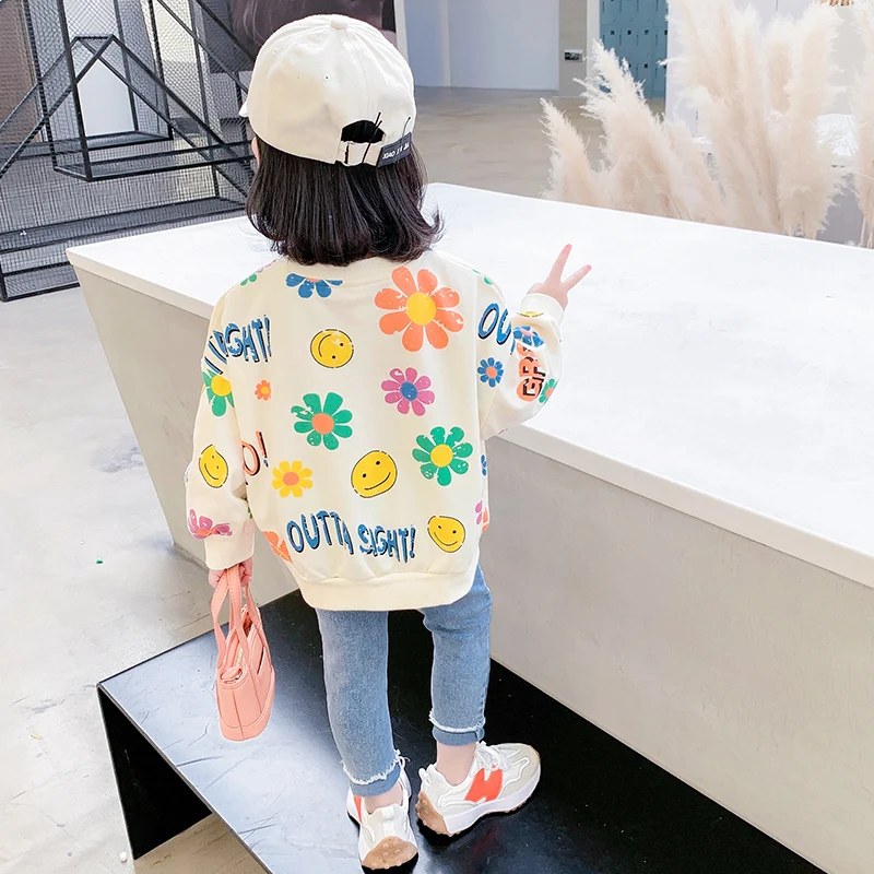 2023 new autumn girl flower smiley face sweater cool girl fashionable sweater soft and comfortable fabric youthful vitality.