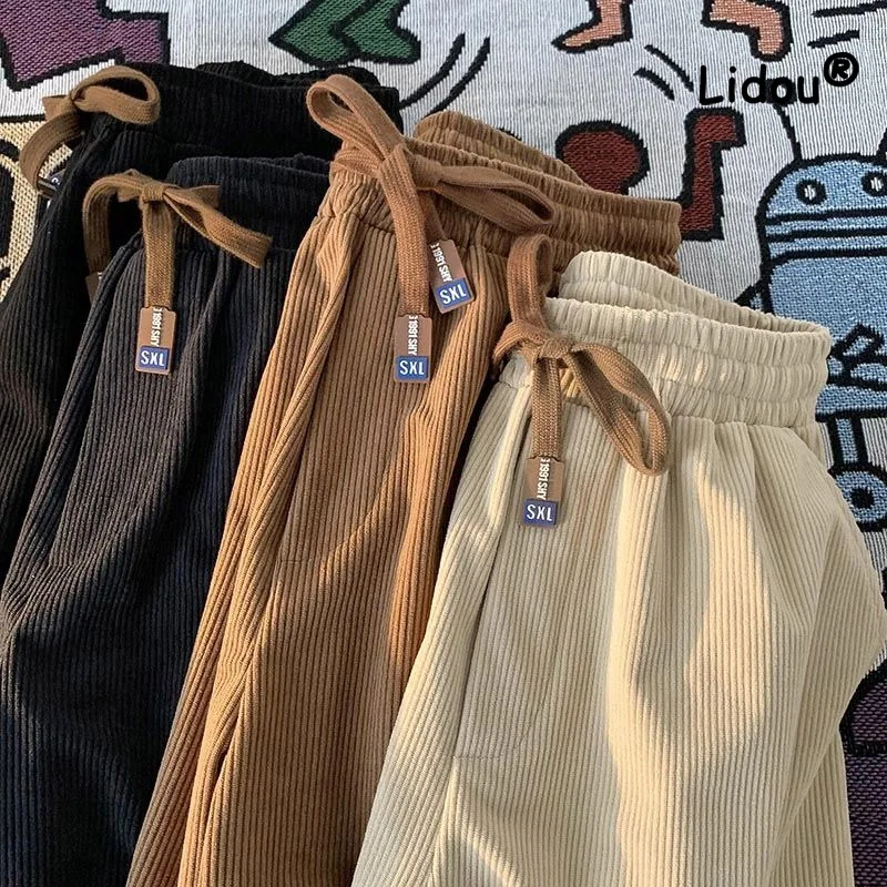 

Casual Solid Color Korean Loose Straight Cylinder Sweatpants New Waist Drawcord Fashion Youth All-match Male Ninth Pants 2023