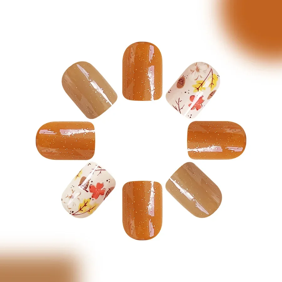 Juego de uñas postizas para mujer y niña, Set de 24 piezas de uñas cortas y brillantes con diseño de Flor naranja, cuadradas, para Otoño e Invierno