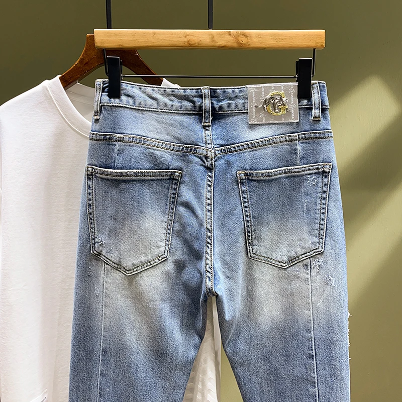 High-end Personality Splicing Raw Edge Hole Men's Jeans Influx Of Elastic Slim Embroidery Patches Small Leg Pants