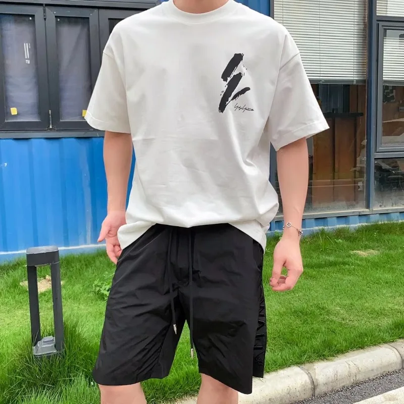 2025, luxuriöses Sommer-Kurzarm-T-Shirt mit handbemaltem Graffiti-Druck-Logo, Baumwolle, für Männer