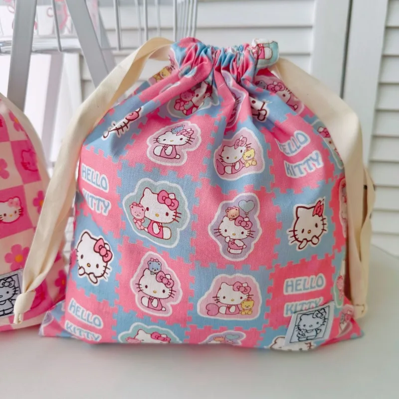 Hello Kitty tissu mode Art Bundle sac de rangement cosmétiques stockage à la main sac décoratif cordon voyage Portable en gros