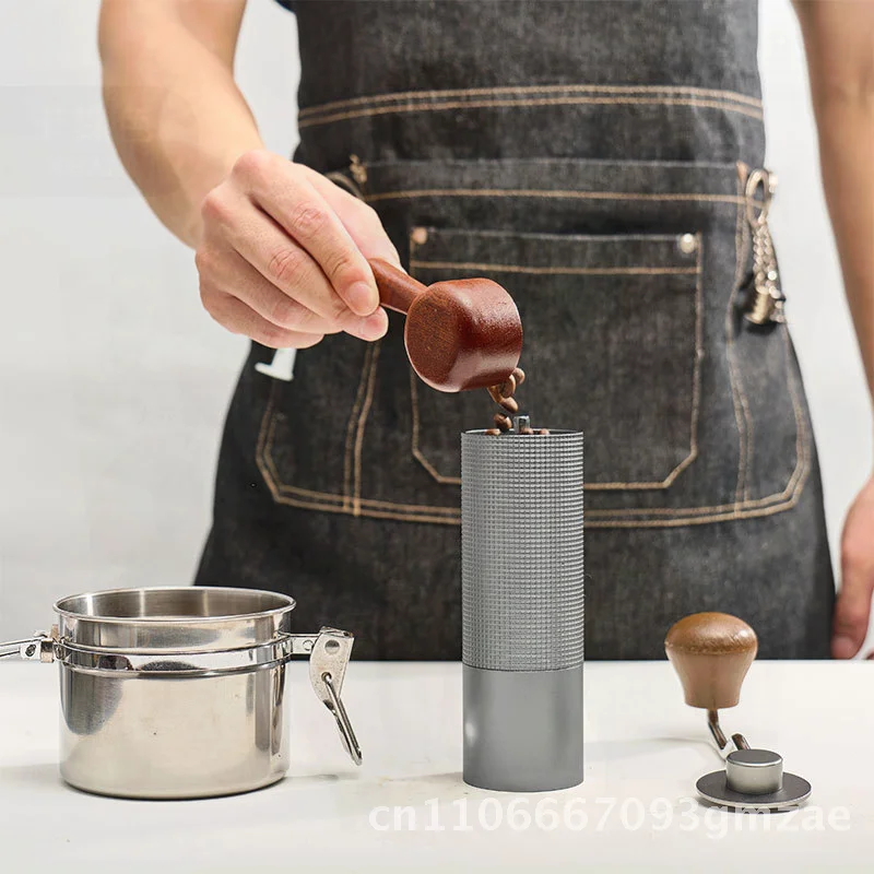 

Amazon Hand Grinder Metal Coffee Mill Manual Crank Coffee Grinder with ABS Handle 5-Star Grid Style in Gray And Black