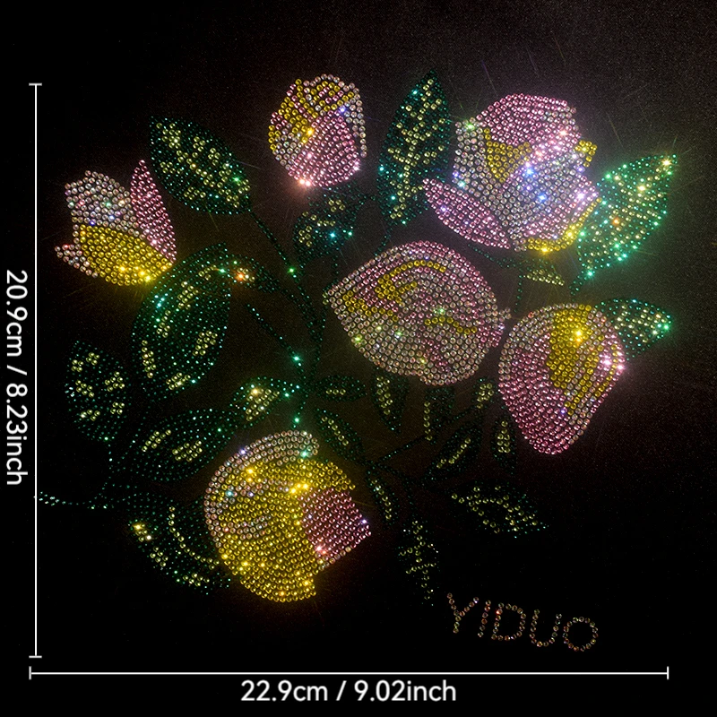 

The beautiful rhinestone flowers are ironed on sweaters, coats and T-shirts. Fashion patches for clothing accessories