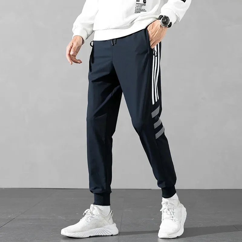 

Men's Ice Silk Pants Summer Thin Loose Trendy Casual Sports Three Bars Nine Points Long Trousers Comfortable Breathable Loose Fi