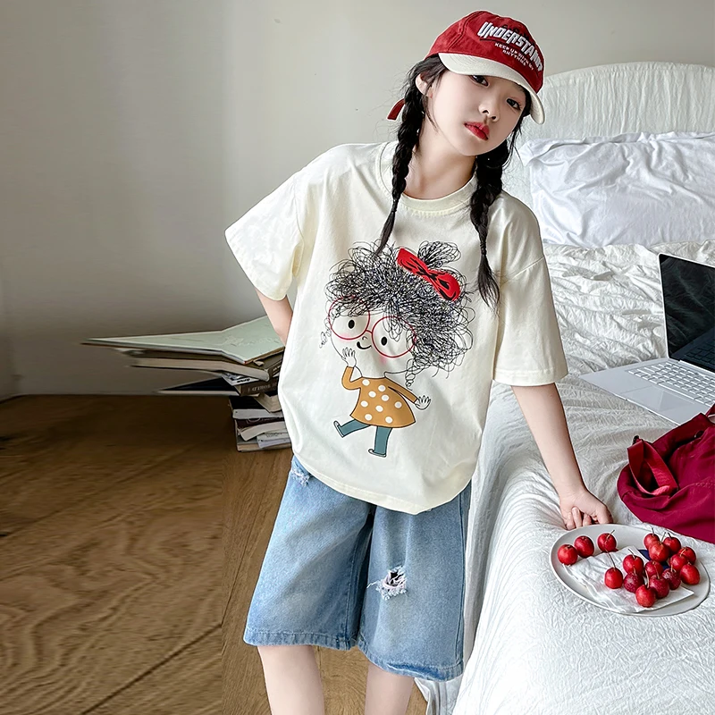 

New Youth Set Summer Girls Eye Print Short sleeved T-shirt+Casual Perforated Denim Shorts 2pcs Set Fashionable Clothing 4T-14T