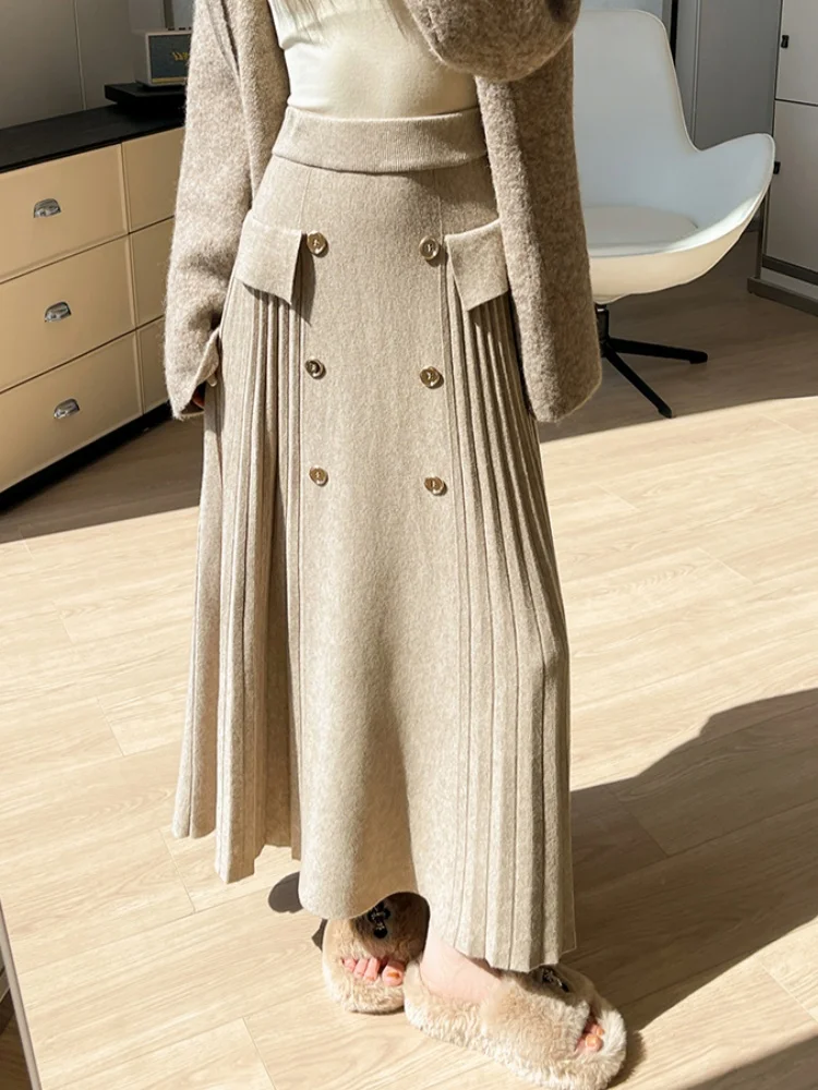 تنورة محبوكة ناعمة لزجة للنساء لخريف وشتاء 2025 بخصر عالٍ للتخسيس تنورة كبيرة متأرجحة على شكل حرف a تنورة مظلة للسيدات