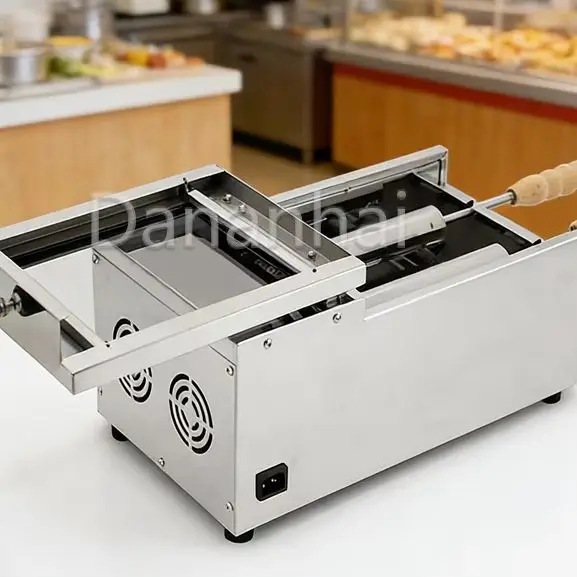 

Коммерческая автоматическая машина для приготовления венгерских кексов (чимей-кейков) для небольших пекарен и кондитерских. Новинка.