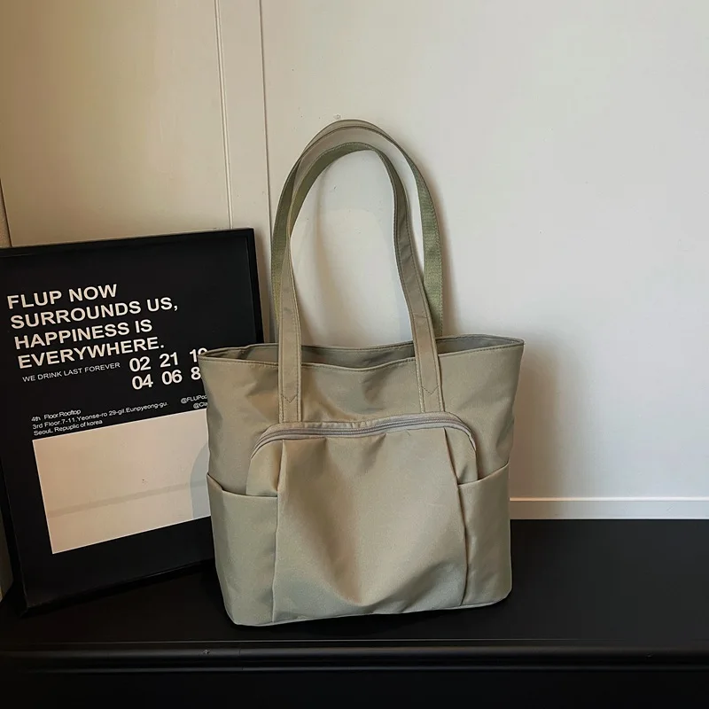 

Новая вместительная однотонная сумка через плечо в корейском стиле из оксфордской ткани, модная и универсальная сумка для покупок с множеством карманов.