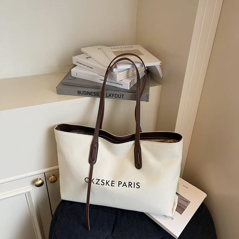 2025 حقيبة عصرية تحت الإبط لها قماش سعة كبيرة محفظة حمل حقيبة كتف كروسبودي عادية ركاب موضة علامة الحروف ​ ​