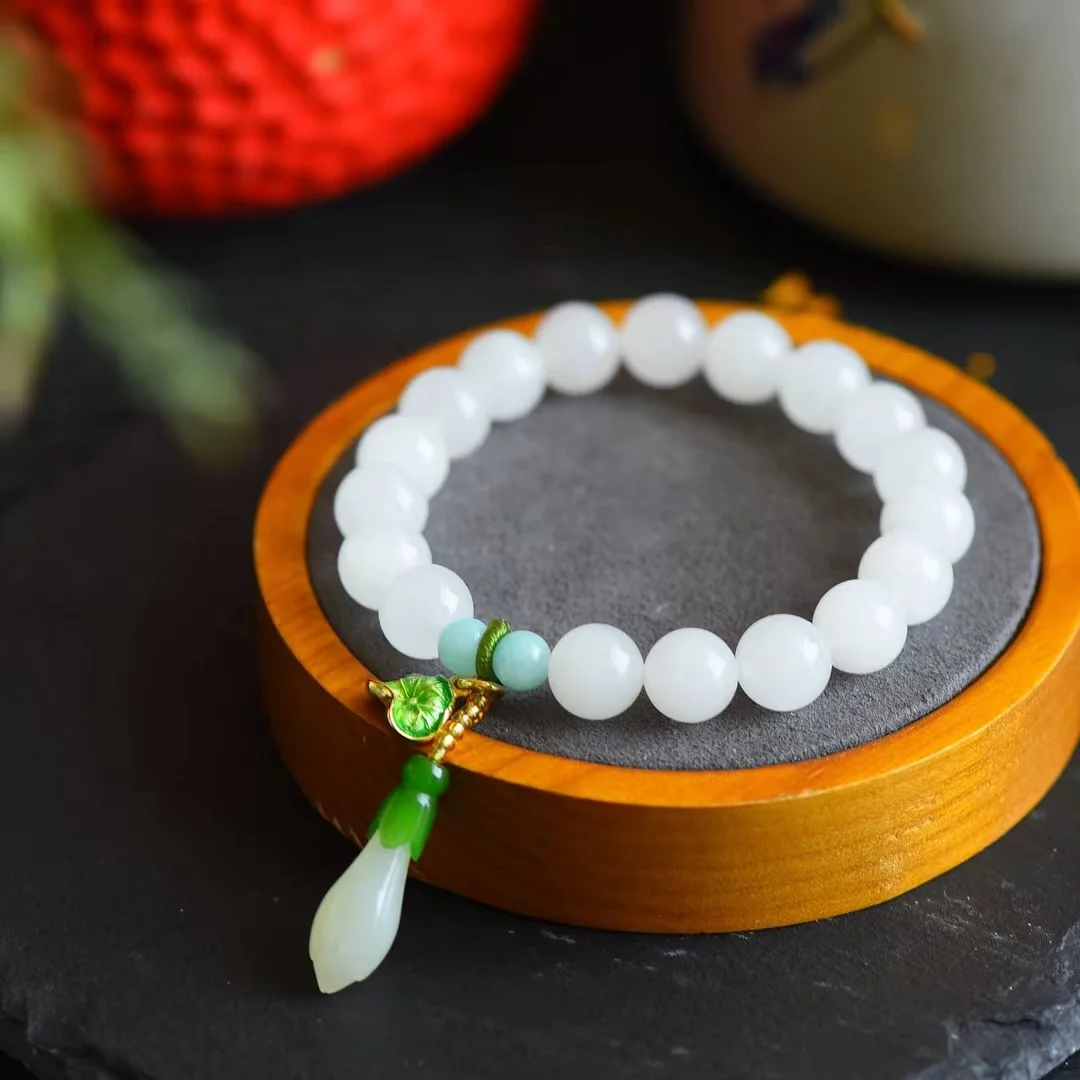 

Hetian Jade Bracelet with Magnolia Flower Ornaments 9331#