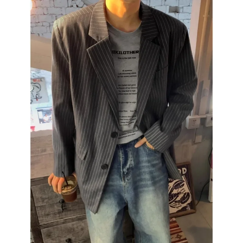 Giacca da uomo piccola tuta a righe dal Design fresco e di fascia alta nera alla moda coreana Casual allentata