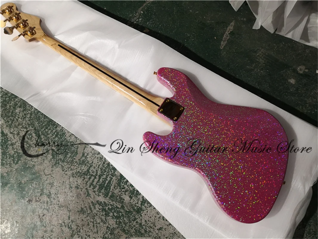 4 strings bass guitar, jaz bass Pink Silver powder particles body,gold buttons,white pearl pickguard fixed bridge gold tuners