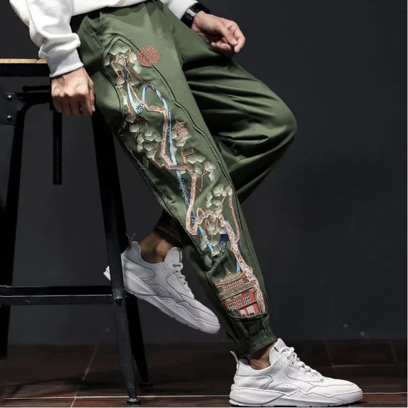 Pantalones casuales para hombre con estampado de cintura elástica, ropa bordada, bolsillos, pies atados, tendencia, combina con todo, joven, primavera, otoño, nueva moda