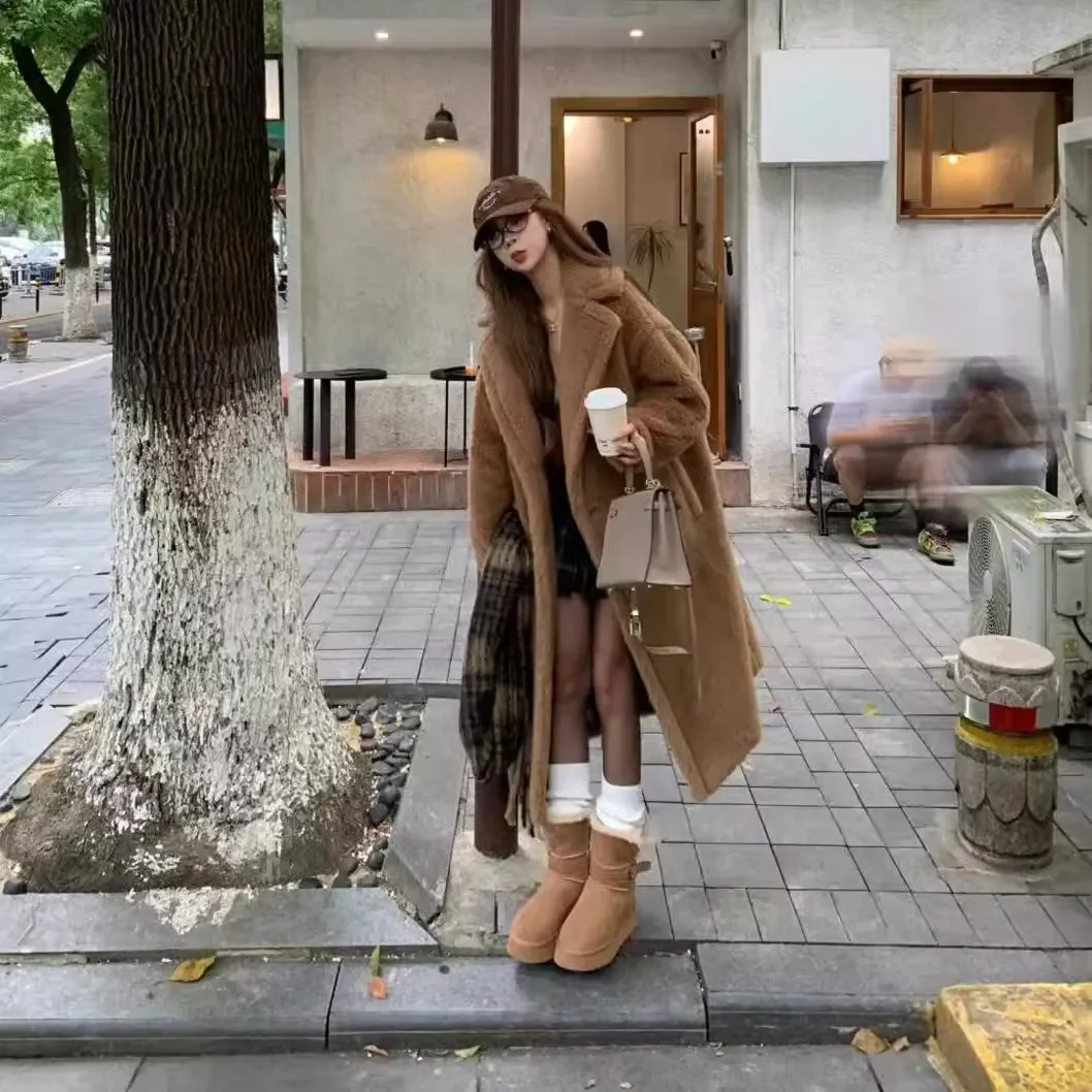 Chaqueta elegante de piel para mujer, abrigo de otoño e invierno, nuevo abrigo peludo, Parka cálida gruesa de largo medio holgado a la moda 2025