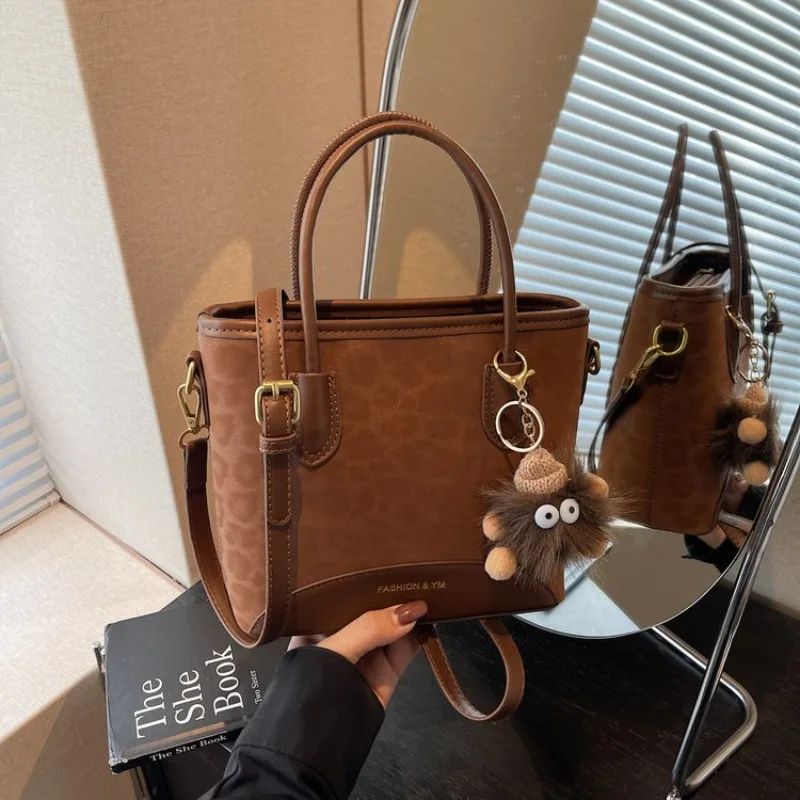 

Элегантные сумки для подгузников от люксового бренда для женщин, простая винтажная сумка через плечо, высококачественная кожаная сумка для поездок на работу, лучшая сумка Superstar Show