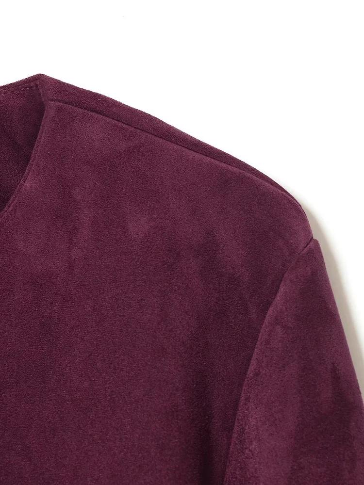 Veste de costume polyvalente et élégante de couleur unie pour femmes, nouvelle mode de style européen avec ceinture et texture velours.