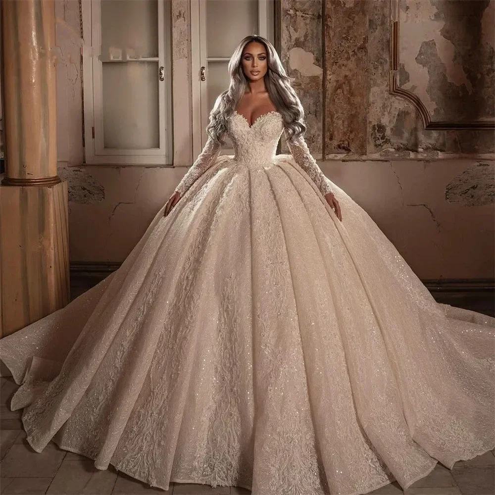 

Customized Luxury Ball Gown Lace Wedding Dresses Beadings Sweetheart Appliques Sequins Long Sleeves Sweep Train Bridal Dresses