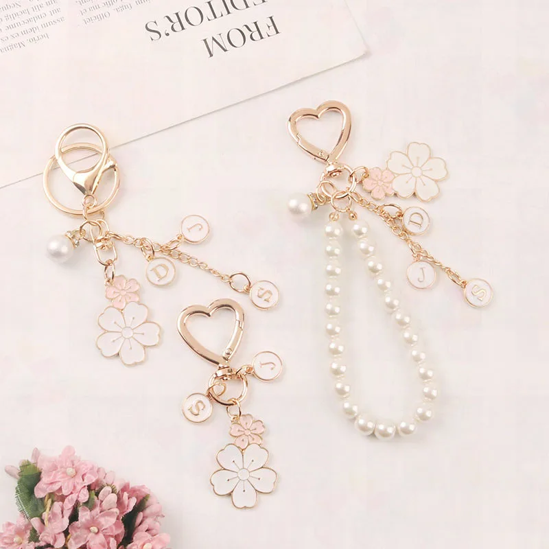 Creative Twin Flower Keychain Cute White Flower Letter Pearl Key Ring Love Key Ring Headphone Cover Bag Hanging Decoration Gift