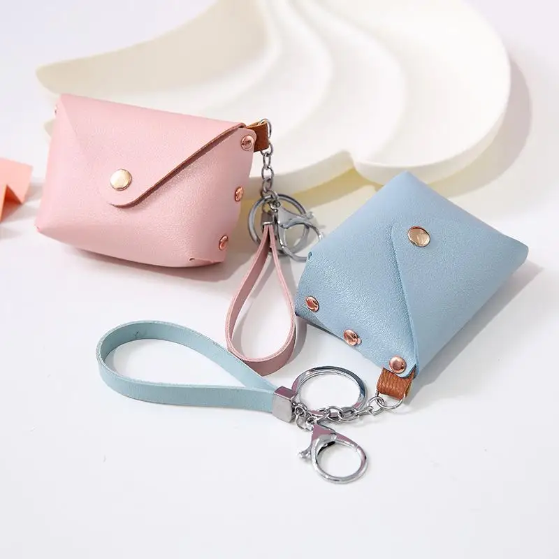 Mini portamonete alla moda Semplice portamonete portatile in pelle PU Borsa portaoggetti per cuffie Portafoglio piccolo con cinturino da polso per donna uomo