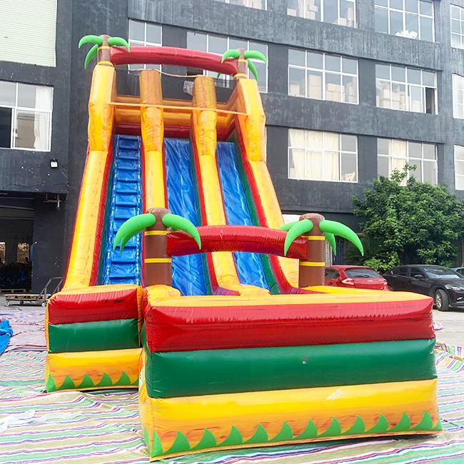 FOR selling  23 ft high double lanes tropical palm tree inflatable slide for kids and adults