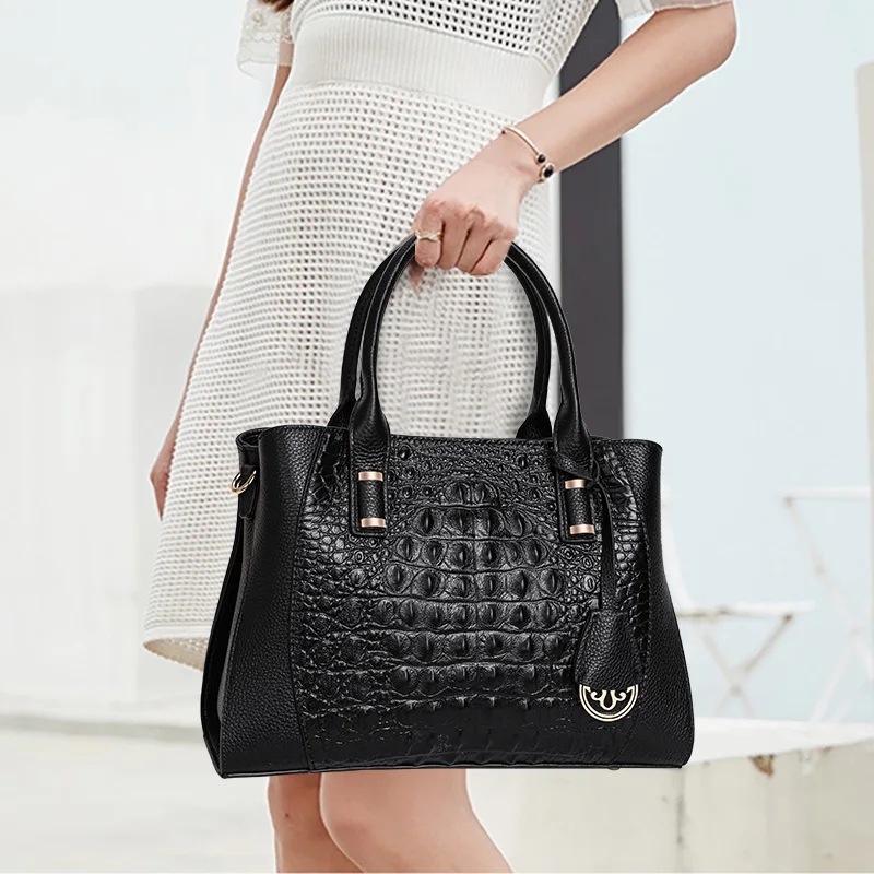 

Aidrani Croc - Embossed Black Tote: Gold Accents, Signature Brand Sophistication