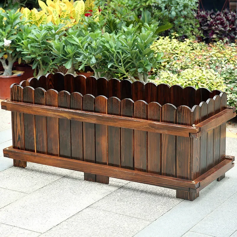 Anti-corrosion wood flower box carbonized solid wood planter outer frame round head flower pot factory direct supply plant