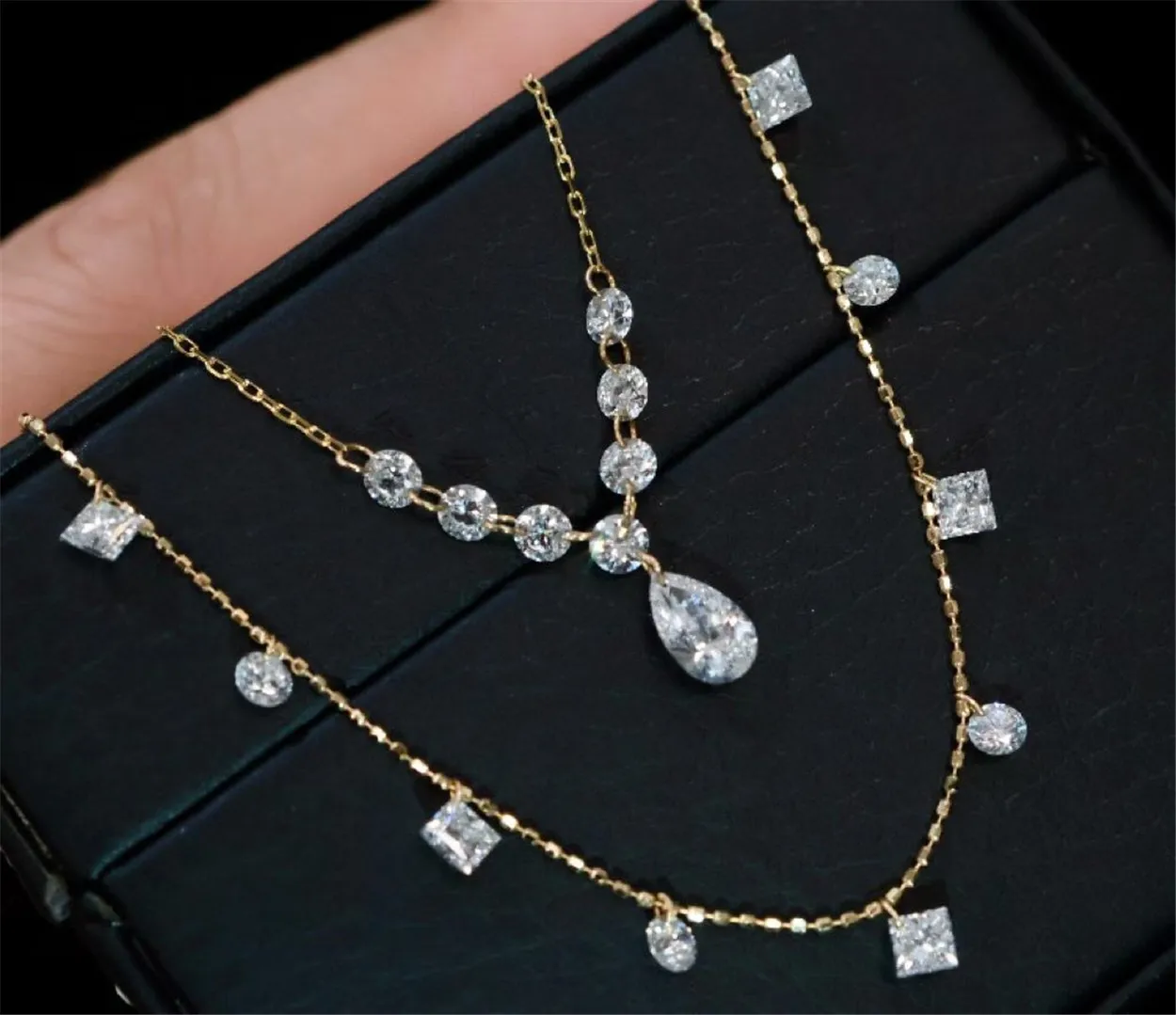 18K gold lab-grown diamond necklace, water droplet and round with drilled holes and clawless setting, custom-designed jewelry