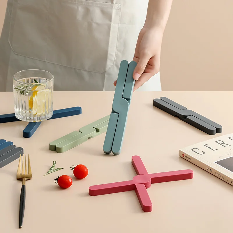 

Insulation pad silicone folding pot mat creative cross folding silicone mat multifunctional kitchen table dish mat coaster