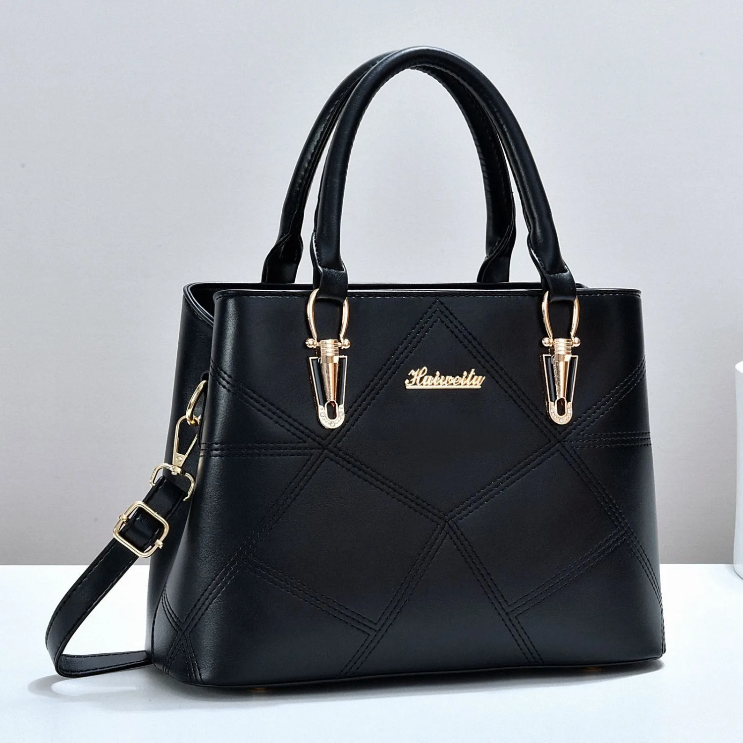 

new design is simple and fashionable women's handbag, adjustable shoulder strap, PU material, large-capacity commuting tote bag