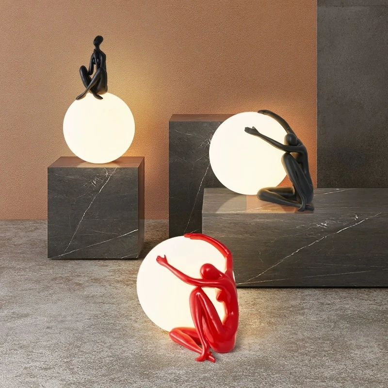 

Modern Popular Art And Creativity Pedestrian Sculpture Ball Holding Decorative Table Lamp Living Room Bedroom Bedside Ball Lamp