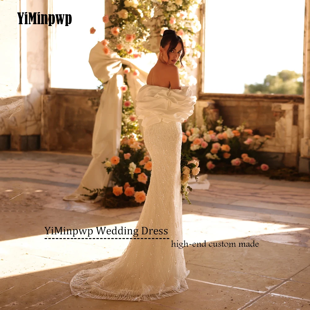 ビーズの高級ウェディングドレスの女性ノースリーブマーメイド花嫁ドレスプリーツ恋人ブライダルドレスvestidosデノビアカスタマイズBeadeing豪華な結婚式のドレスの女性の袖レスの美人魚の花嫁のガウンプリーツの愛の心の花嫁のドレス vestidos de noviaカスタマイズされた