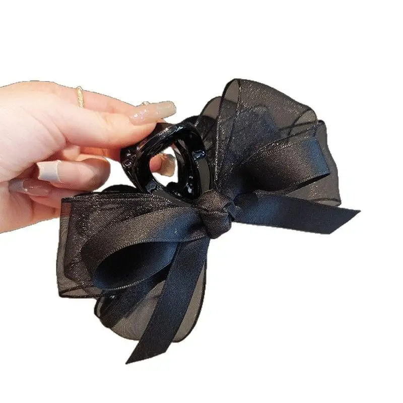 Hochwertige schwarze transparente Haarspange mit Schleife, elegantes Haar-Accessoire für den Hinterkopf. – Detail 5