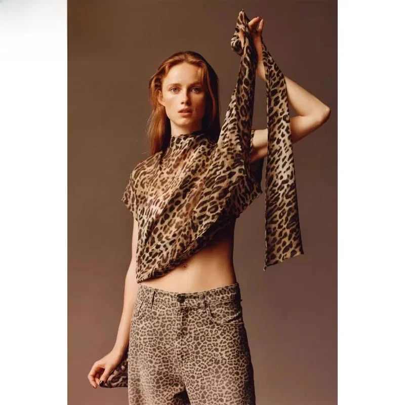 เสื้อแฟชั่นผู้หญิงลายเสือดาวผูกโบว์ ทรงเข้ารูป คอกลม ความยาวปกติ แขนยาว ลายทางอเนกประสงค์