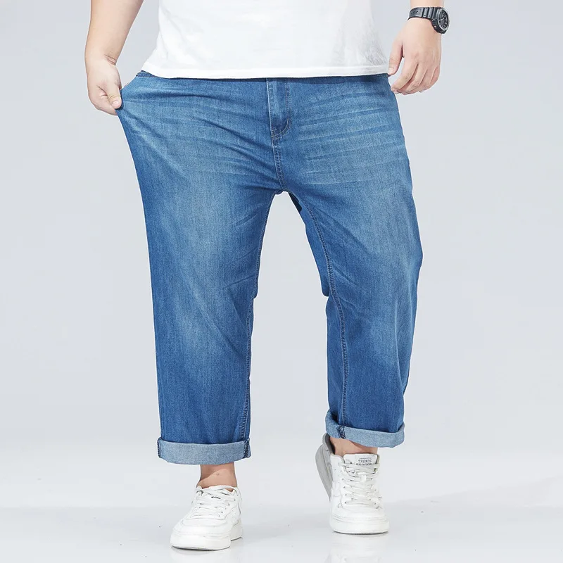 

New summer men's jeans nine-minute trousers ankle-length straight casual thin section loose big yards stretchy cropped pants