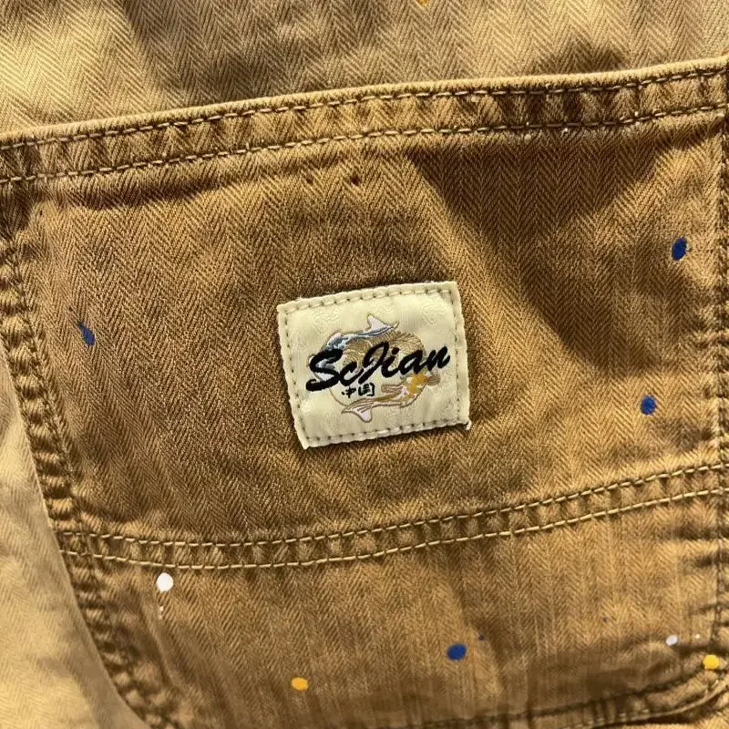 Pantaloncini di jeans larghi da uomo con tasche Pantaloni jeans corti da uomo Larghi dritti Allentati elasticizzati Tendenza 2025 Jorts Bottoni Blu Cowboy Xl