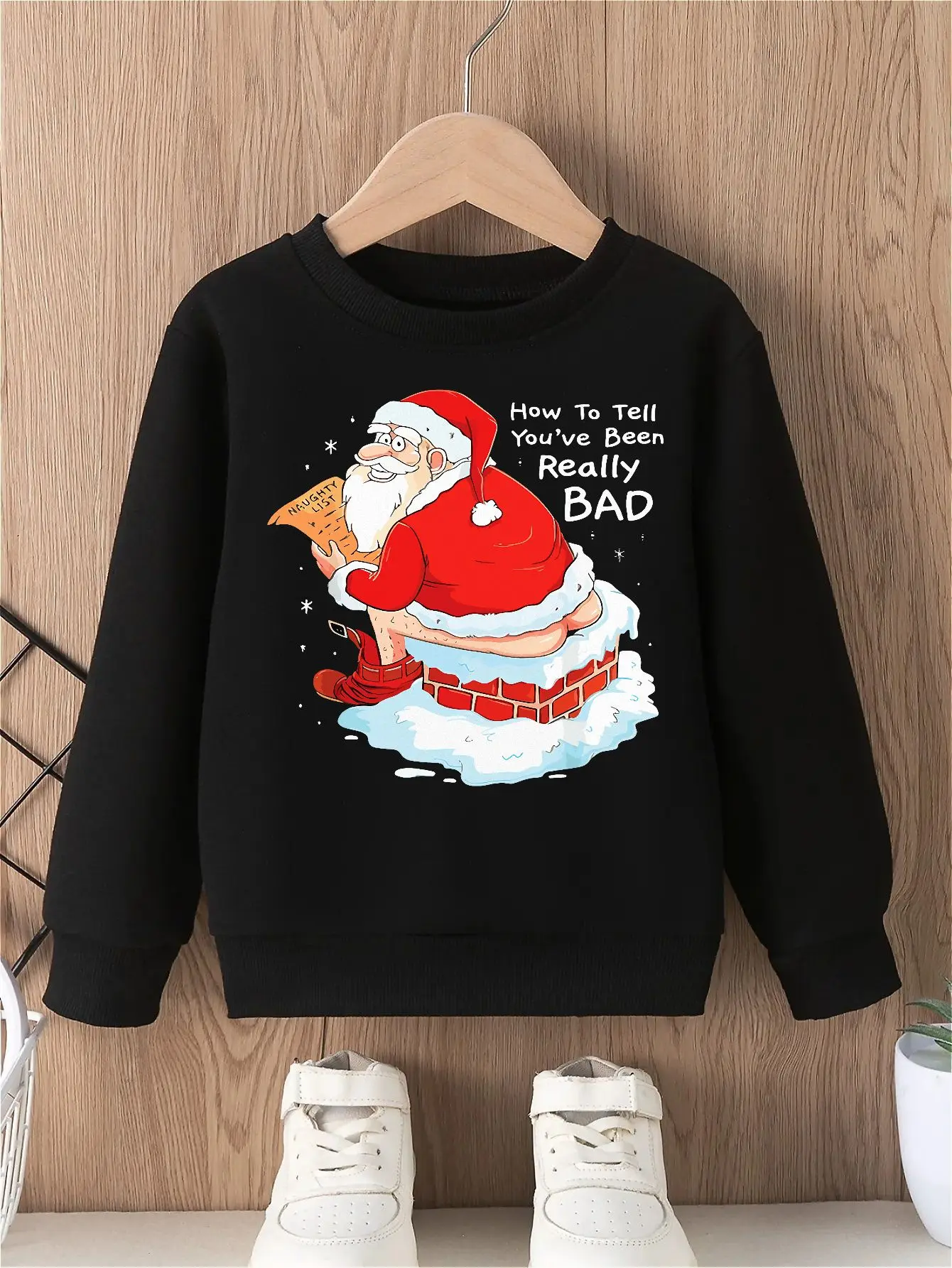 Christmas theme boy's sweatshirt with playful Santa design comfortable round neck long sleeved top perfect holiday festivities