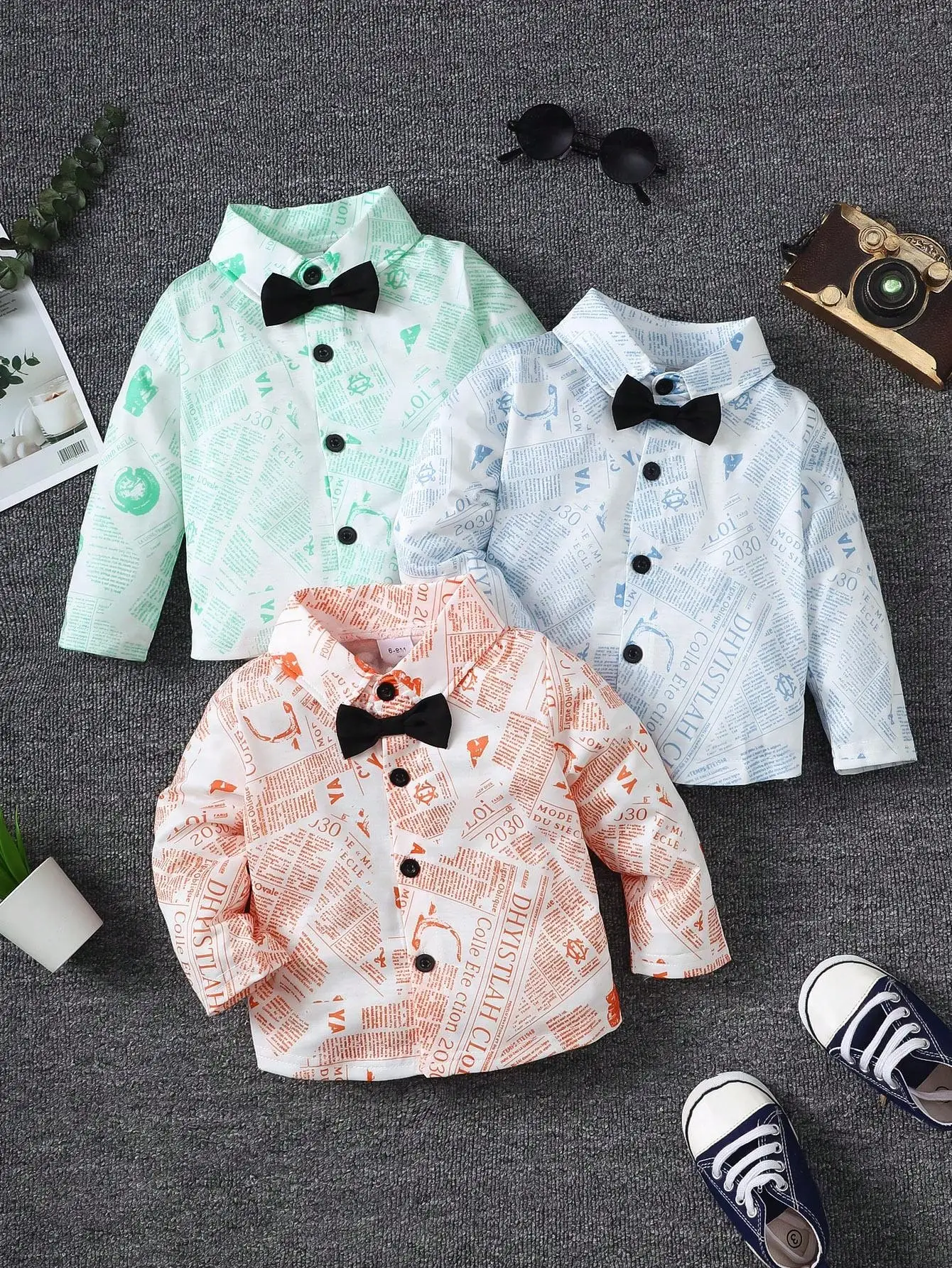 New Newspaper-Printed Long-Sleeved Shirt Set for Boys, Complete with a Stylish Black Bow Tie, Available in Three Fresh Colors, Suitable for Various Occasions Such as Baby's Birthday, Parties, and Everyday Outings, Creating a Stylish Gentlemanly Look for Little Boys.