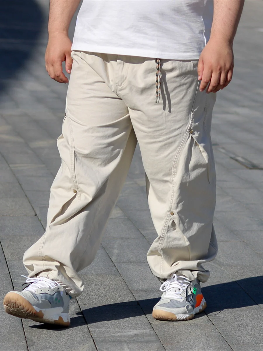 

Брюки свободного кроя с заклепками и регулируемыми манжетами, 3D-кроем и прямым силуэтом, для весны и лета