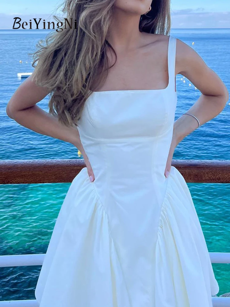 Beiyingni-vestido francés con lazo y espalda descubierta para mujer, Mini vestidos cortos acampanados informales de Color sólido para citas y vacaciones, novedades de verano