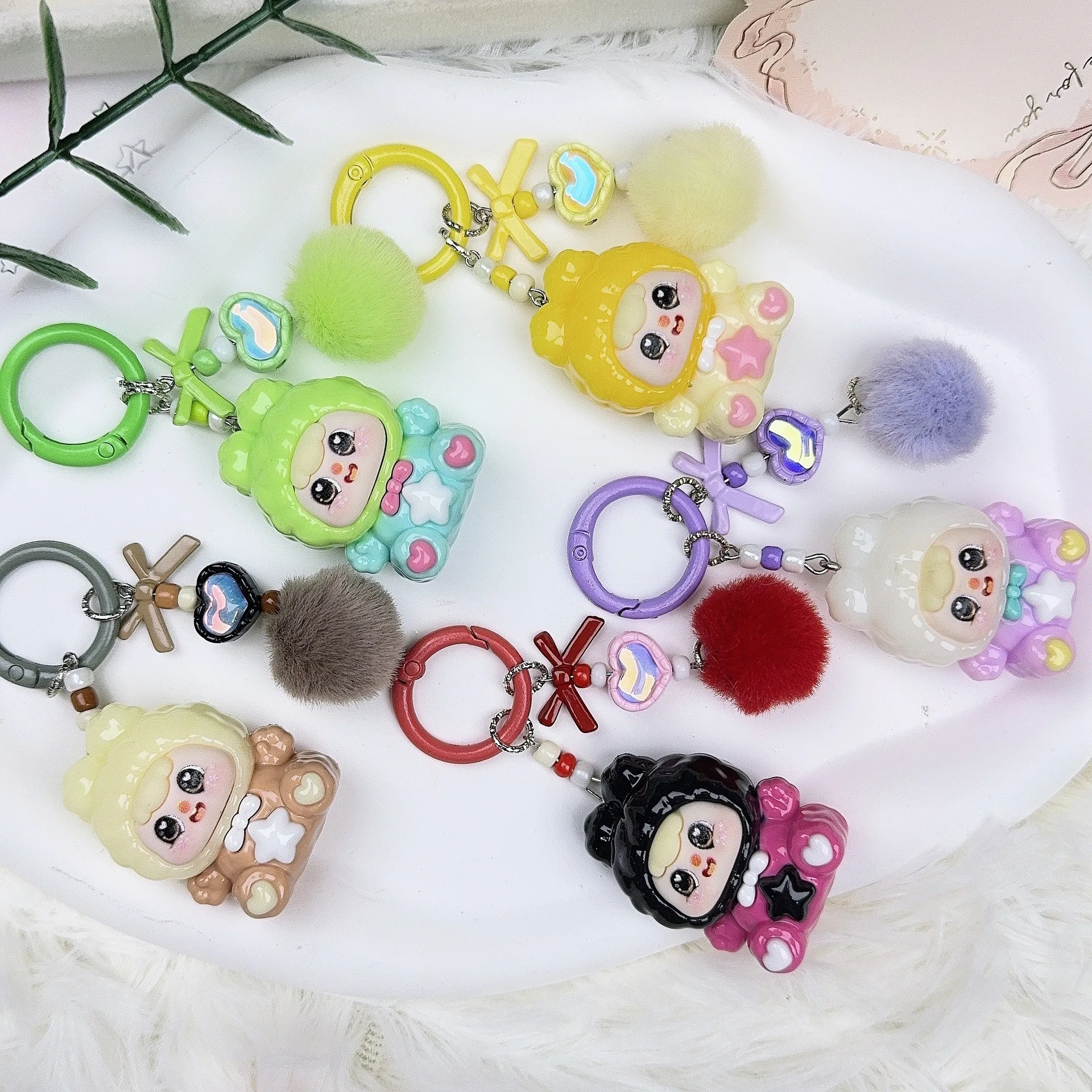 

1PCSMengling sitting posture figurine, cartoon schoolbag accessory, resin part, car bag keychain