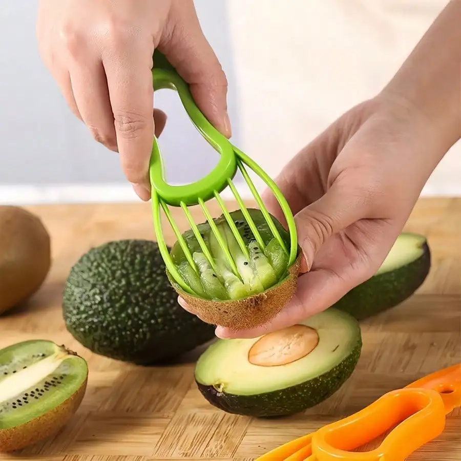 3-In-1 multi-functional avocado tool, universal peeling cutter and scraping spoon, practical green fruit and vegetable gadget