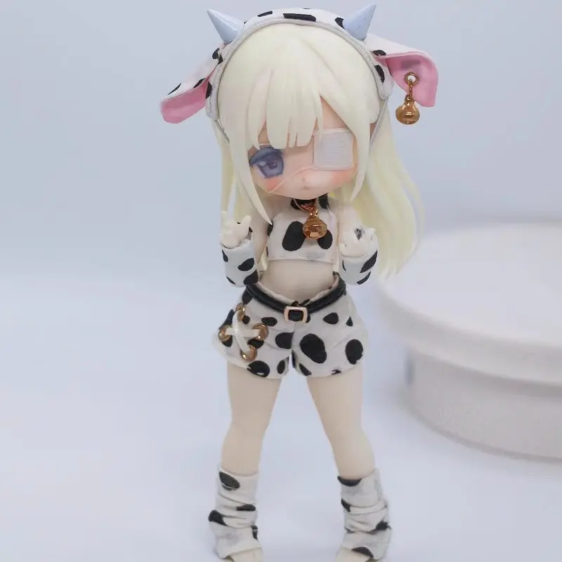 

Комплект одежды для кукол с коровьим принтом для кукол OB11 BJD 1/12 с повязкой на голову с рожками, топом, шортами и гетрами для коллекционеров кукол BJD.