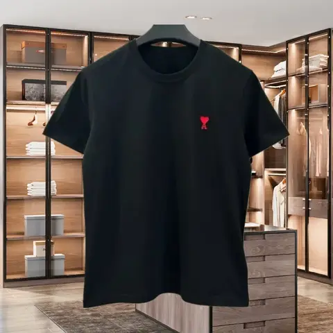 새로운 눈길을 끄는 순수 코튼 반팔 티셔츠 남성과 여성 모두를위한 고품질의 새로운 여름 유행과 다재다능한 탑