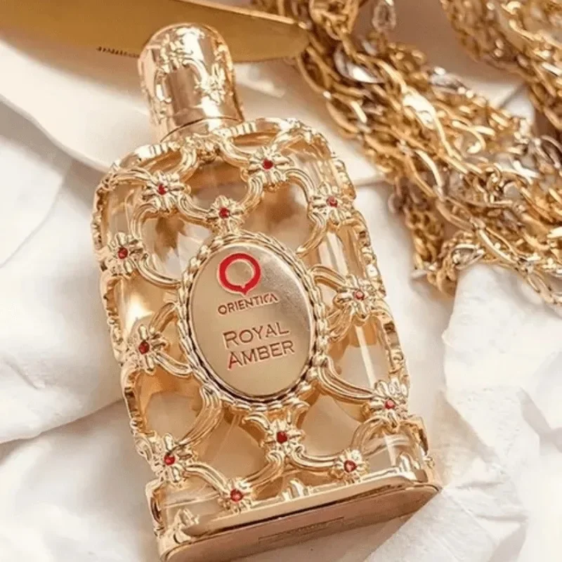 

Luxury Unisex Perfume 100ml – Long-Lasting Oriental Fragrance for Men & Women Spicy Woody Gourmand Scent Red & Gold Bottle