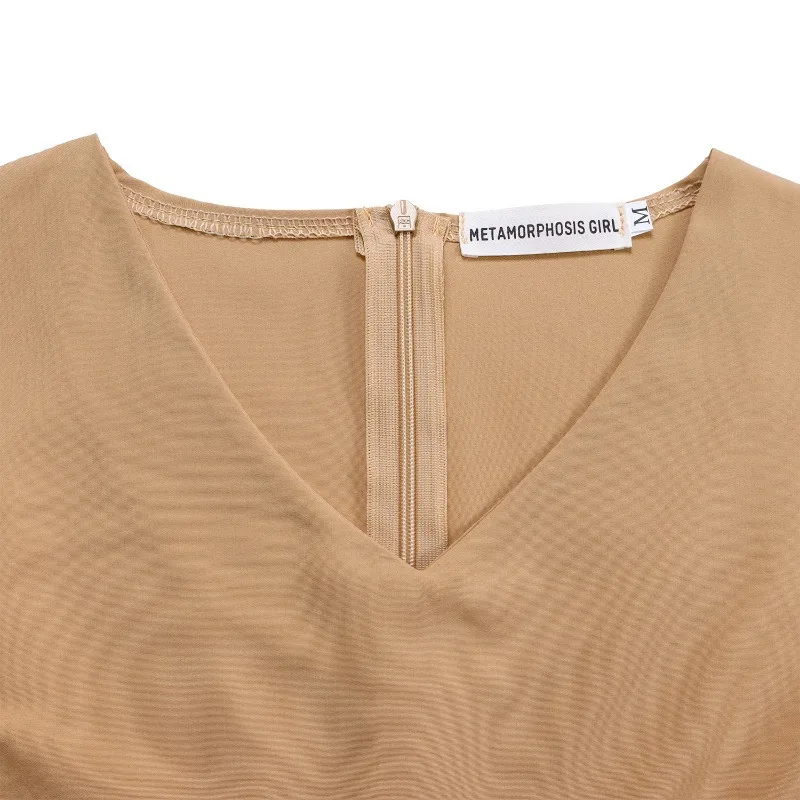 Temperamento alla moda primaverile e accessori per costumi eleganti con gonna a trapezio in tinta unita