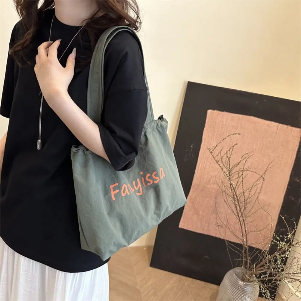 

Simple Korean Drawstring Tote Bags Lightweight Casual Letter Shoulder Bag Designer Large Capacity Handbag Outdoor